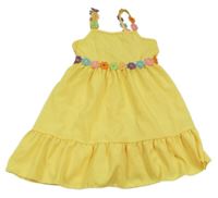 Žluté šaty s kytičkami 