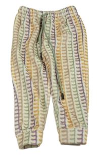 Smetanovo-barevné vzorované plyšové tepláky 