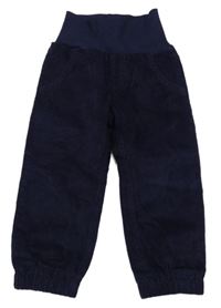 Tmavomodré manšestrové podšité kalhoty s úpletovým pasem zn. Pocopiano