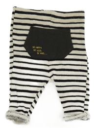 Bílo-černé pruhované pletené tepláky s nápisem Nutmeg