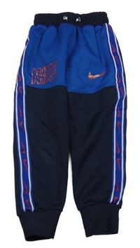 Tmavomodro-červené sportovní tepláky Nike 