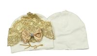2x bavlněná čepice - smetanová + smetanovo-zlatá s květy a mašlí