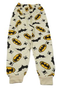 Béžové tepláky s logy Batmana