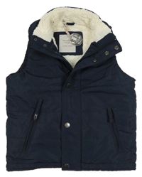 Tmavomodrá šusťáková zateplená vesta 