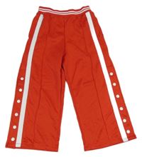 Nové - červené sportovní tepláky s bílými pruhy Next