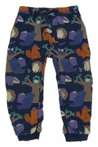 Tmavomodré tepláky se zvířátky a stromy M&S