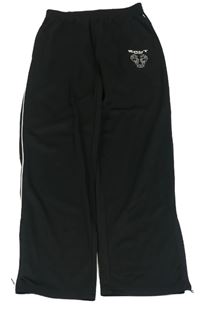 Černé sportovní tepláky s draky NKD