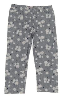 Tmavomodro-bílé pruhované capri legíny s květinami Topolino