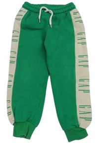 Zeleno-béžové tepláky s logem GAP