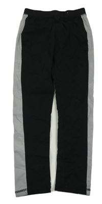 Černé sportovní legíny s pruhem