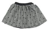 Černo-bílá kostkovaná sukně s puntíky Mayoral