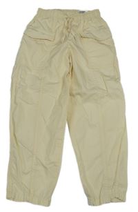 Krémové plátěné cuff kalhoty s kapsami H&M