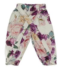 Bílé lehké teplákové kalhoty s květinami 