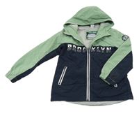 Zeleno-tmavomodrá šusťáková jarní bunda s nápisy a kapucí Dopodopo