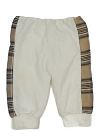 Bílé tepláky s béžovým pruhem 