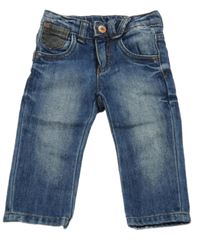 Modré skinny rifle s číslem Benetton