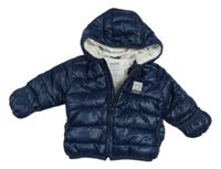 Tmavomodrá šusťáková prošívaná zimní bunda s kapucí Kanz