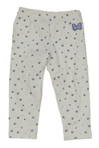 Bílé legíny s drobnými kytičkami a motýlem