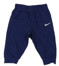 Tmavomodré tepláky s logem Nike