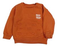 Oranžová mikina s nápisem Nutmeg