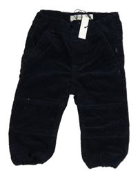 Nové - tmavomodré manšestráky name it.