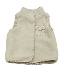 Smetanová huňatá podšitá vesta s květy a větvičkami a kapsou PRIMARK