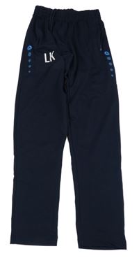 Tmavomodré funkční sportovní tepláky s písmenky JAKO