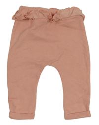 Světlerůžové tepláky s volánkem Matalan