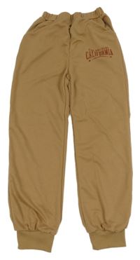 Béžové tepláky s nápisem 