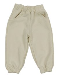 Smetanové vzorované tepláky 