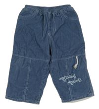 Tmavomodré podšité manšestrové kalhoty s nápisem 