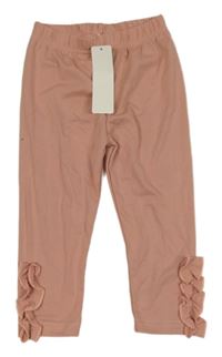 Nové - Světlerůžové legíny s volánky 