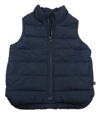 Tmavomodrá prošívaná šusťáková zateplená vesta GAP