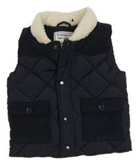 Tmavomodrá prošívaná šusťákovo/manšestrová zateplená vesta Matalan