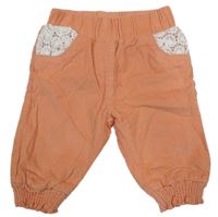 Světleoranžové cuff manšestrové podšité kalhoty s krajkou Topomini