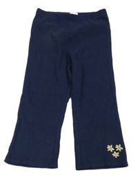 Tmavomodré žebrované lehké tepláky s květy zn. John Lewis