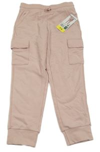 Nové - světelrůžové tepláky s kapsami 