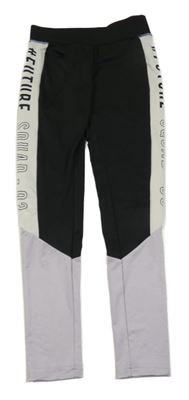 Černo-smetanovo-fialové sportovní legíny s nápisem Ergeenomixx