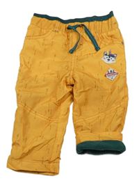 Okrovo-tmavozelené šusťákové podšité kalhoty s nášivkami Ergee