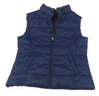 Tmavomodrá puntíkatá prošívaná šusťáková zateplená oboustranná vesta Benetton 