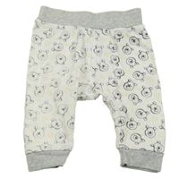 Bílé lehké tepláky s Púem Disney