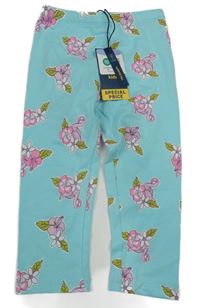 Nové - světlemodré legíny s květinami 