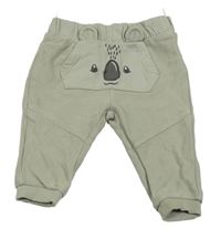 Béžové tepláky s čumákem C&A