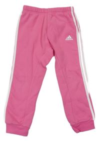 Růžovo-bílé tepláky s pruhy a logem Adidas
