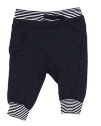 Tmavomodro-bílé tepláky s pruhy H&M