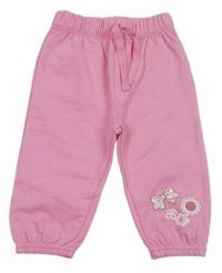 Růžové tepláky s mašlí a květy