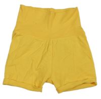 Žluté bavlněné kraťasy s Púem H&M