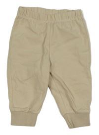 Světlebéžové tepláky