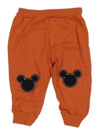 Tmavooranžové tepláky s Mickey