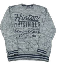 Tmavomodrý melírovaný svetr s nápisem C&A